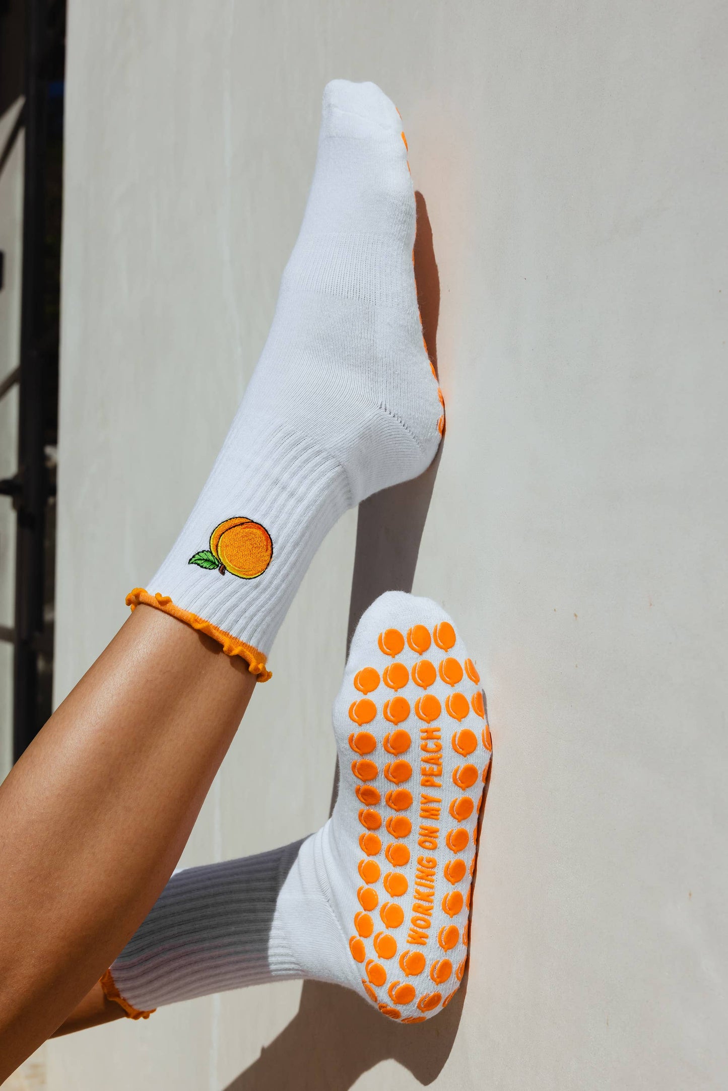 Working On My Peach Grip Socks